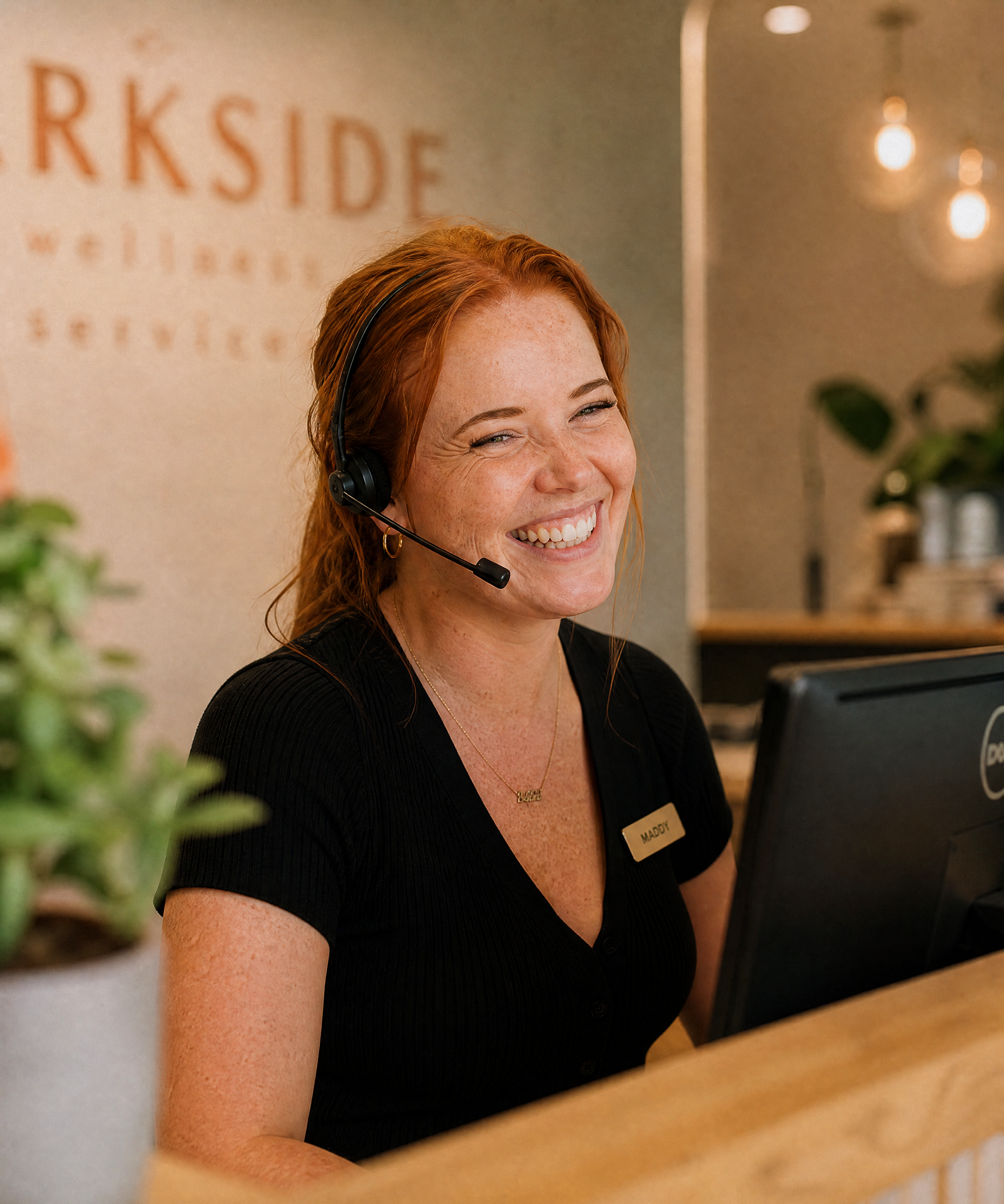 Lily answering calls at a service desk